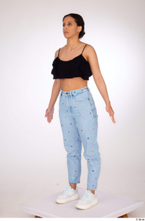 Jimena a-pose black ruffled crop top blue embellished jeans casual…